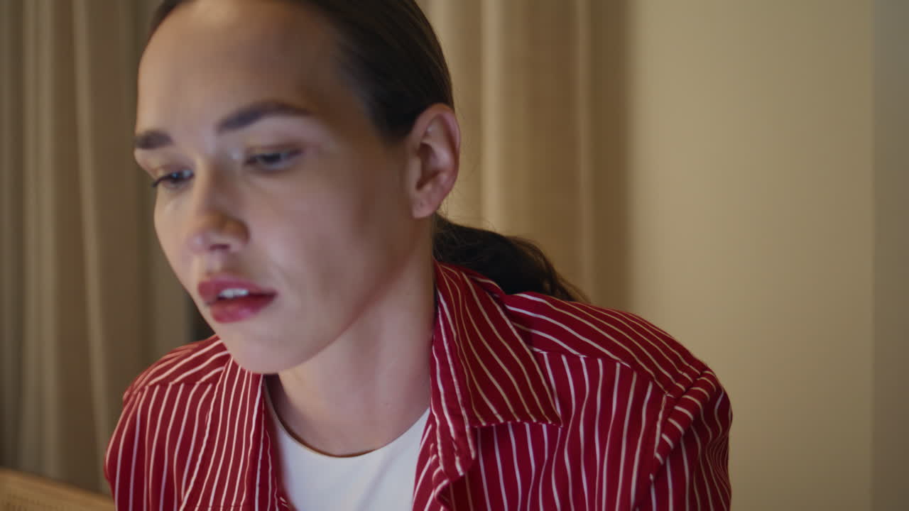 Closeup freelancer talking smartphone at home. Tired manager working evening