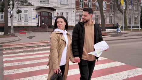 caucasian tourist couple in the city.