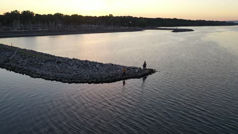 fishing at sunrise on a lake