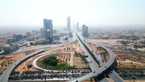 Aerial-timelapse-cars-driving-on-road-through-desert-in-Middle-East