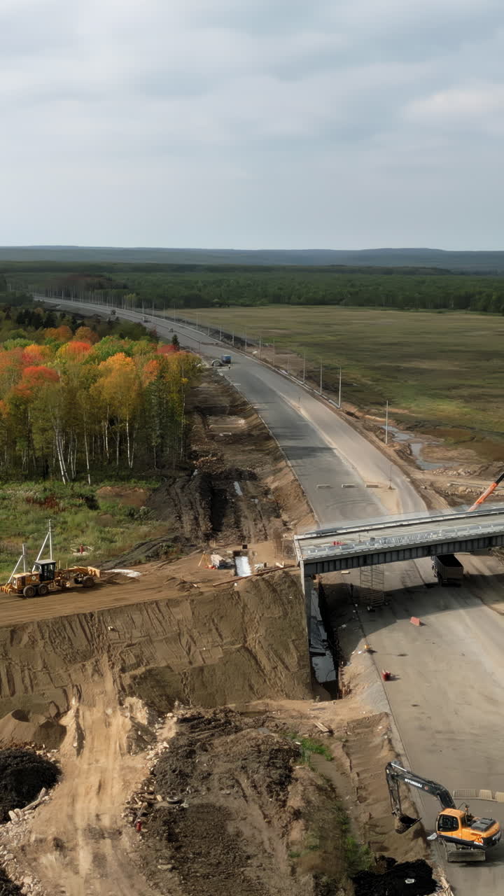 Aerial View of New Road and Bridge Construction in a Rural Setting
