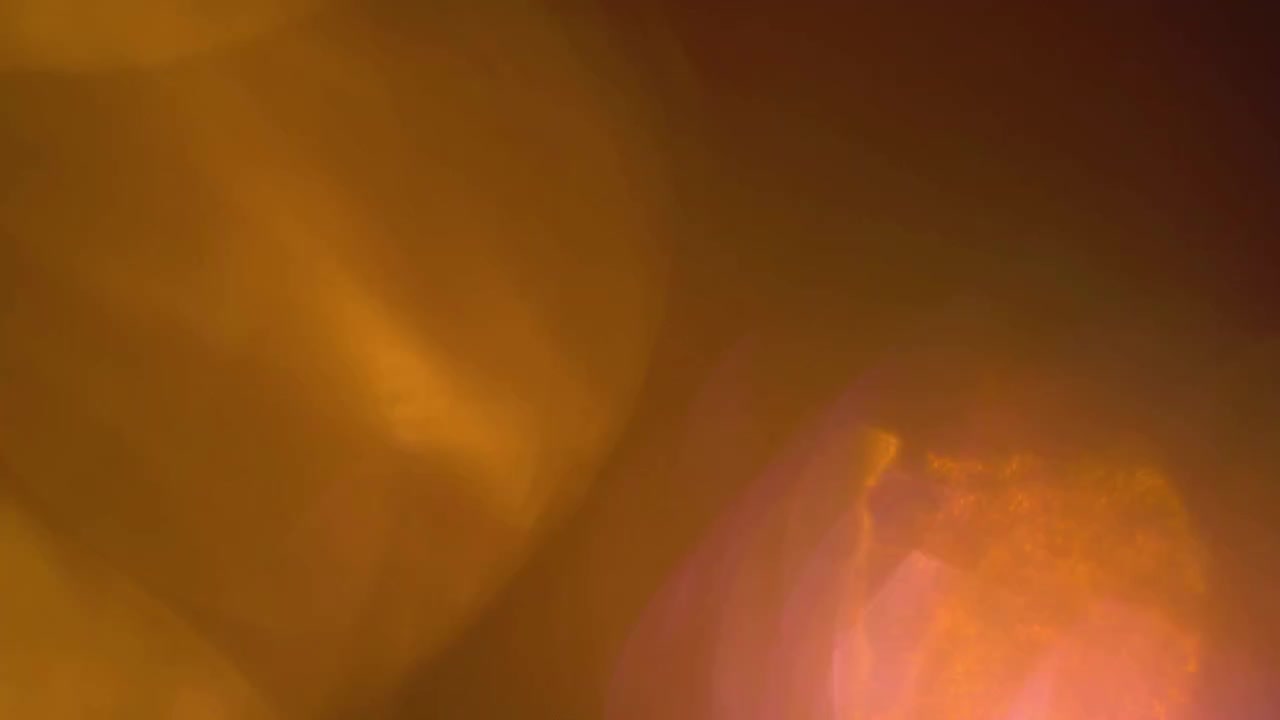 Abstrakte goldene Lichtlecks und Lens Flares