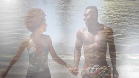 animación de una feliz pareja afroamericana en la playa sobre el mar