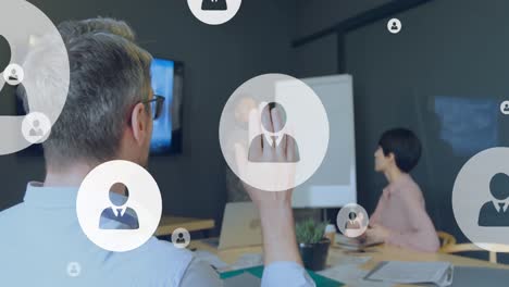 animation of profile icons over rear view of caucasian man rasing his hand during a presentation