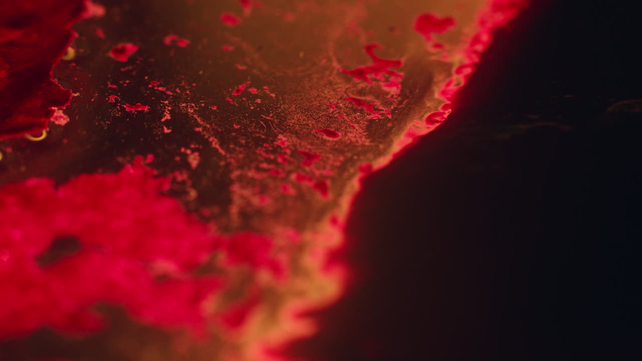 Colourful, organic, liquids macro shots buzzing and flowing