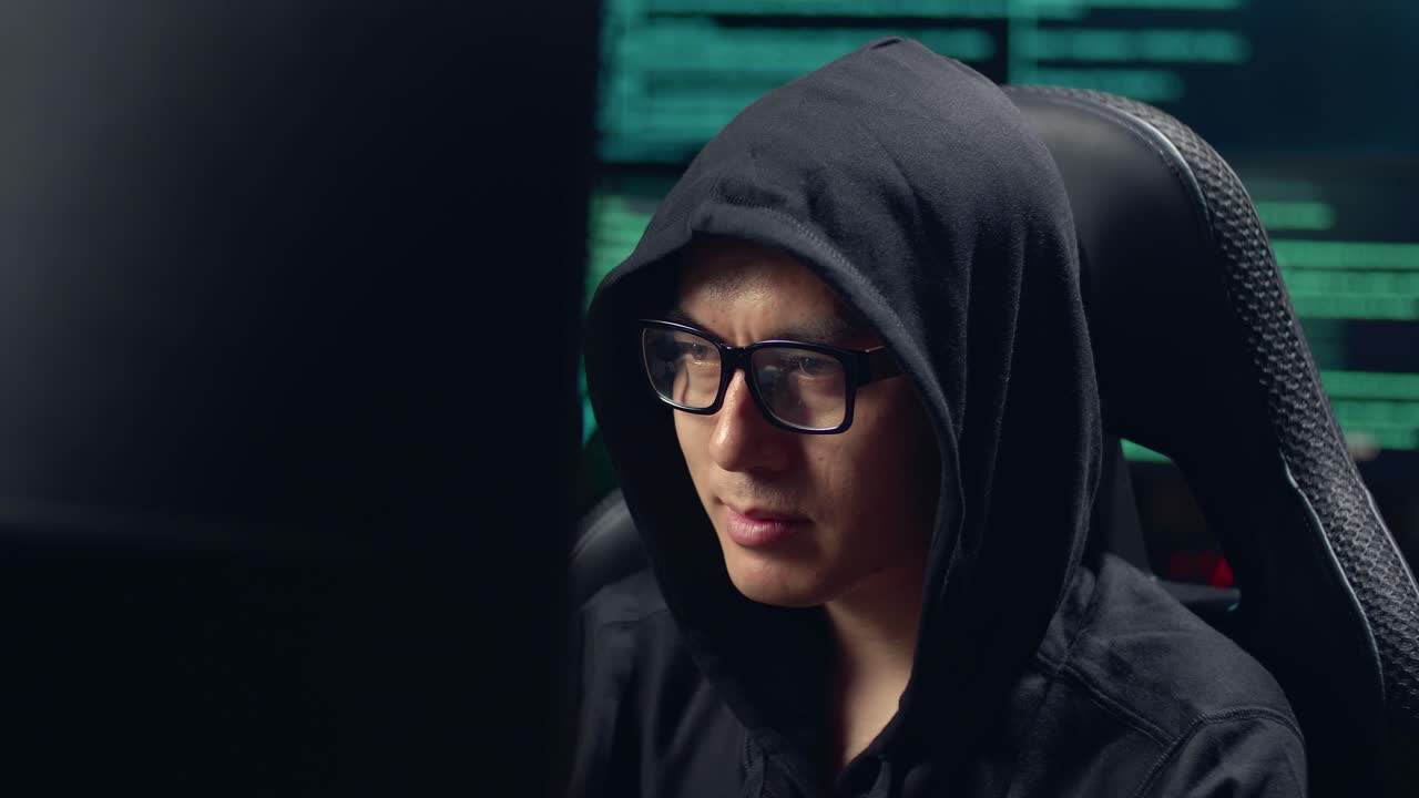 Successful Asian Male Hacker Using Computer Hacking