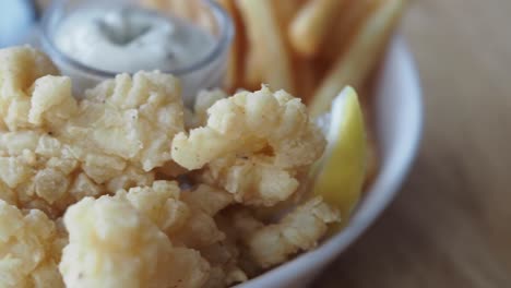 fried calamari with fries and dip