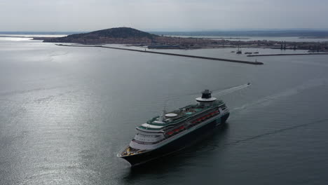 giant cruise ship aerial view sete mont saint clair in background. france cloudy