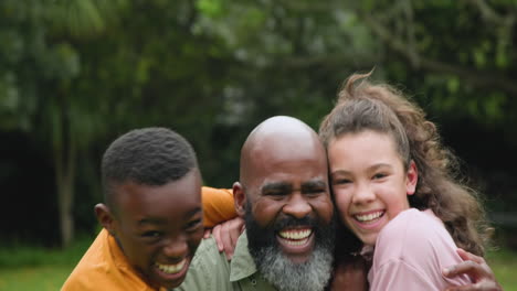 joyful family embracing outdoors, laughing and enjoying quality time together