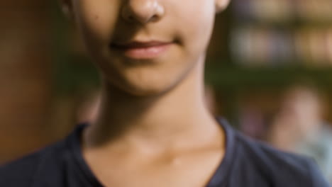 Closeup-of-smiling-boy-holding-the-Bible