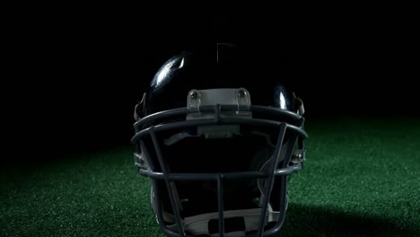 American-football-head-gear-on-artificial-turf-4k