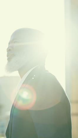 thoughtful businessman outdoors