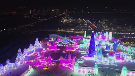 dramatic night lighting of harbin ice festival, northern chinese city