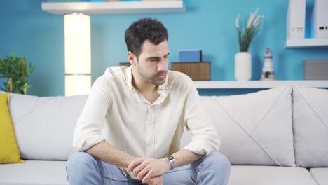 angry young man calming himself down.