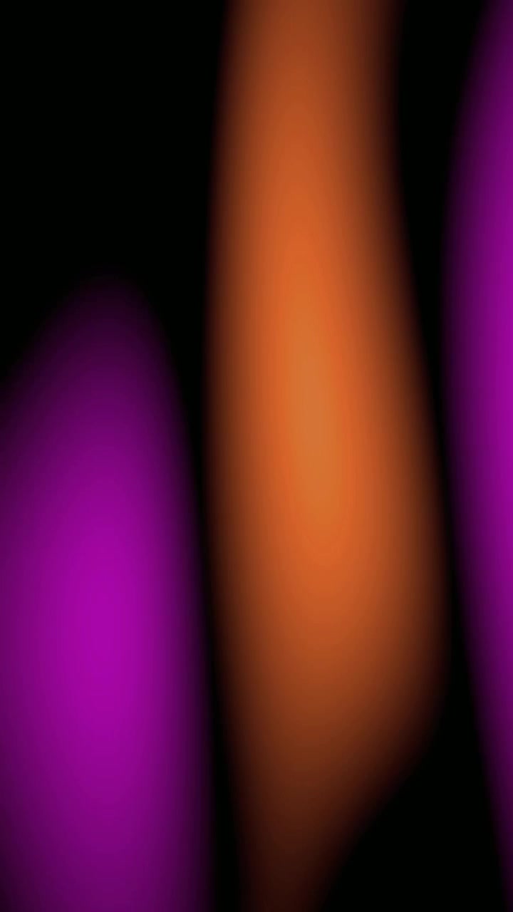 Abstract Motion Background with Blurry Orange and Purple Light Leaks