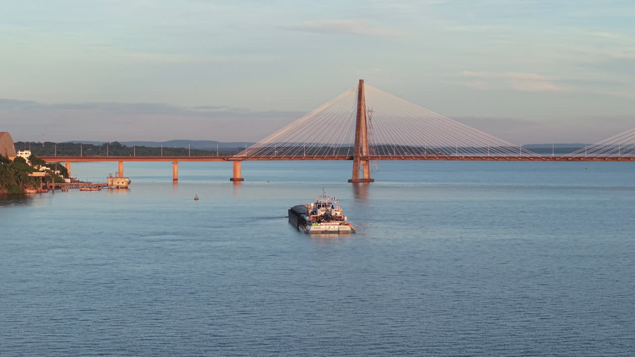 Aerial view of commercial barge navigating Parana River, infrastructure for global trade