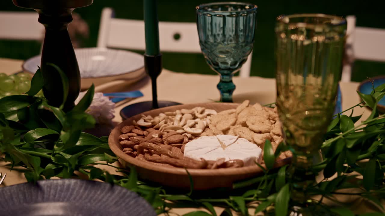 Elegant Dinner Table Setting with Gourmet Food and Decorations