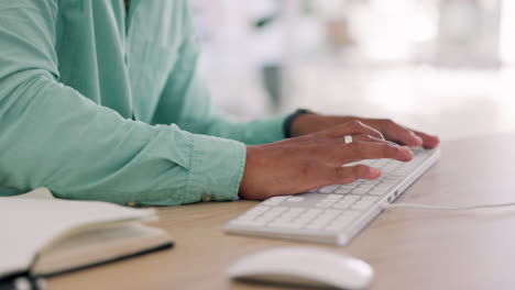 Hands,-keyboard-and-business-man-typing-in-office