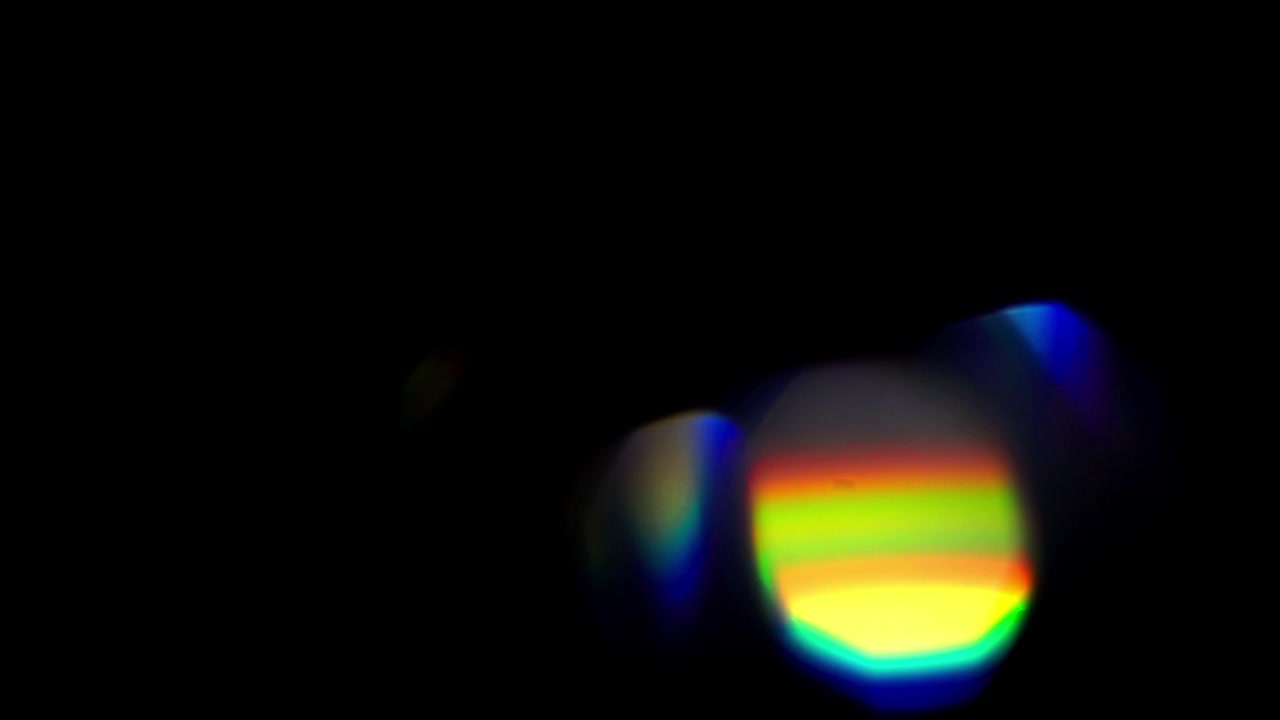 Perdite di luce astratte ed effetti luce lente su sfondo nero