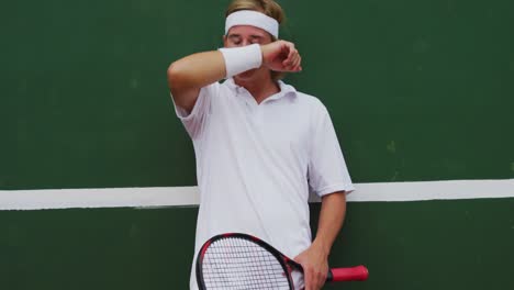 tennis player against a wall