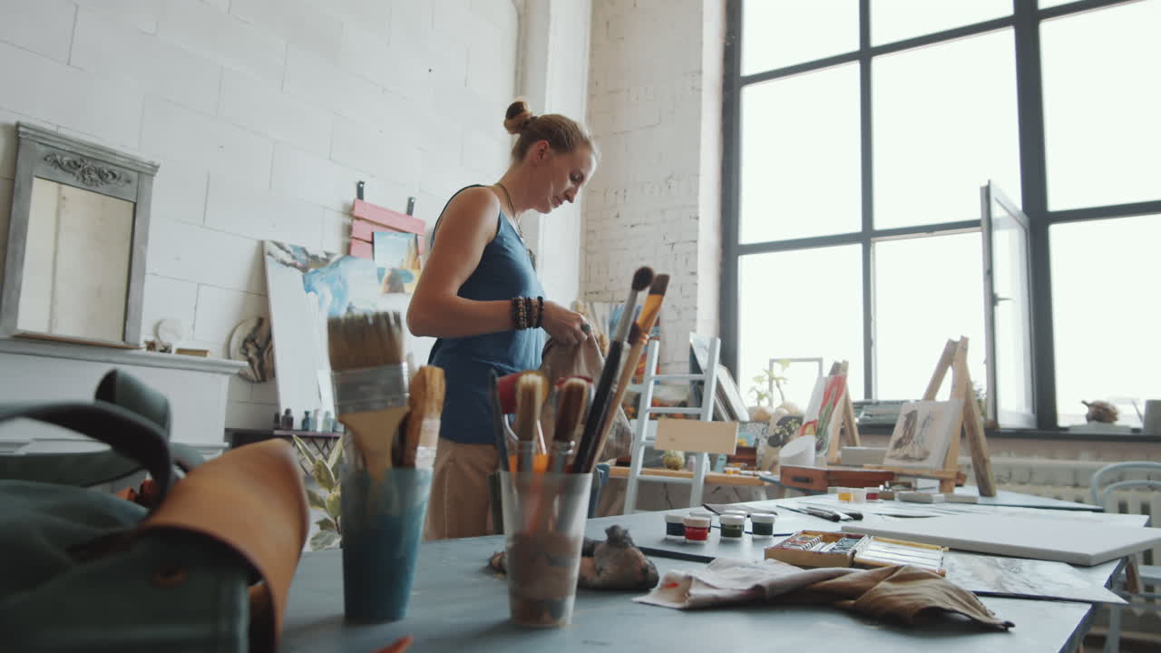 Woman painting in her art studio