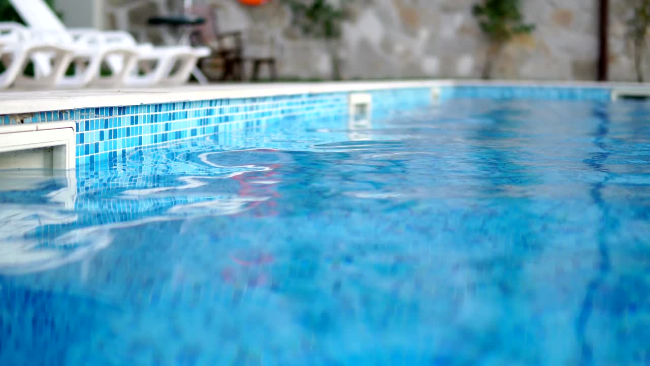 Swimming Pool. Hotel, Summer, Vacation, Sport, Waves, Tourism, Travel, Relax, Resort. Background LOOP