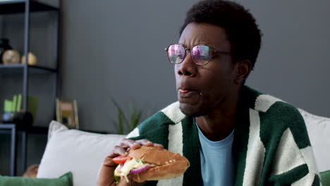 man eating burger