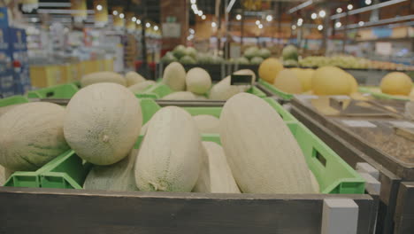 cantaloupe display in grocery store