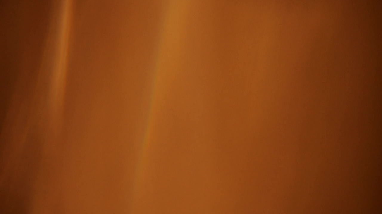 un fondo de niebla dorada que se siente tan cálido y pacífico: un videoclip abstracto completamente natural