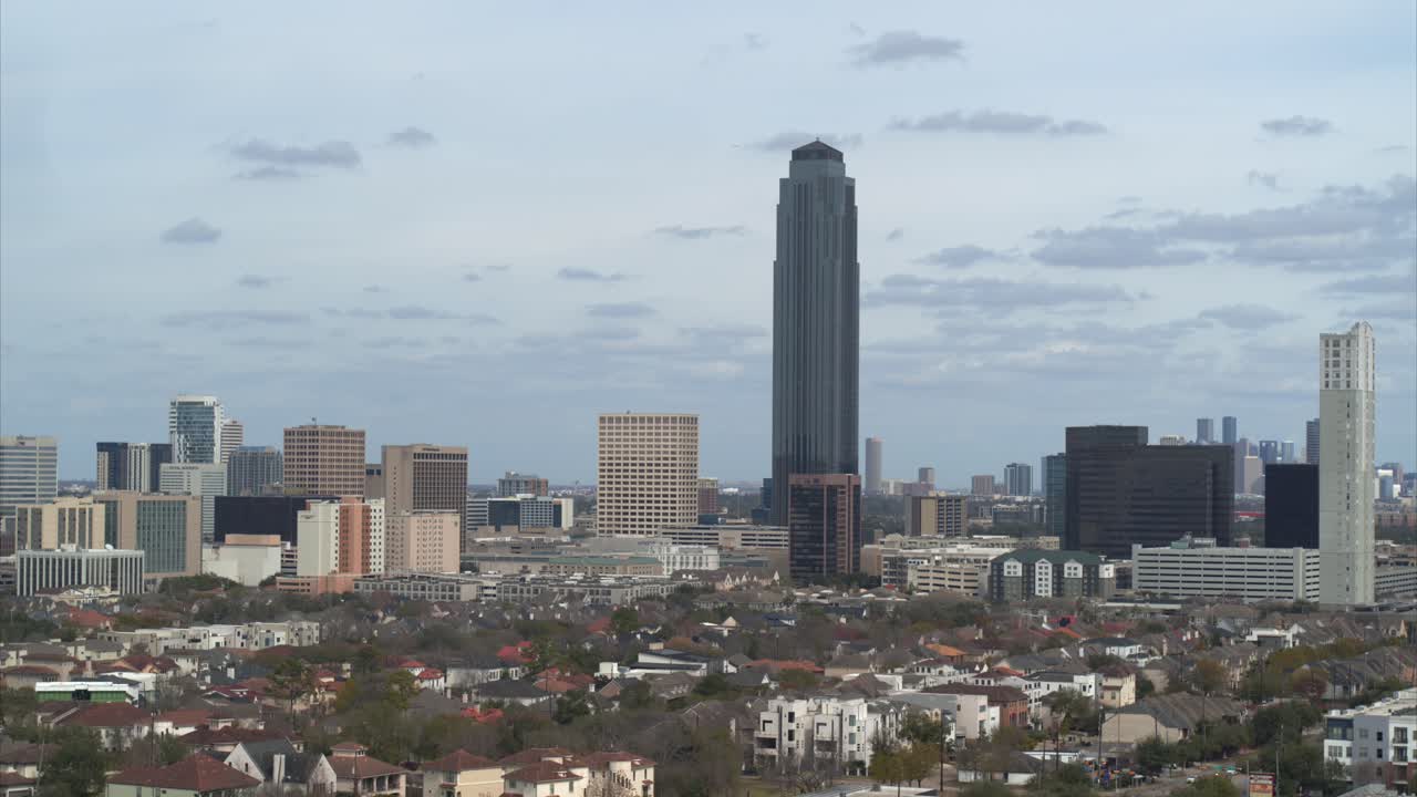 Establishing aerial shot of the Williams Tower and surrounding commercial development in Uptown Houston's prestigious Galleria district