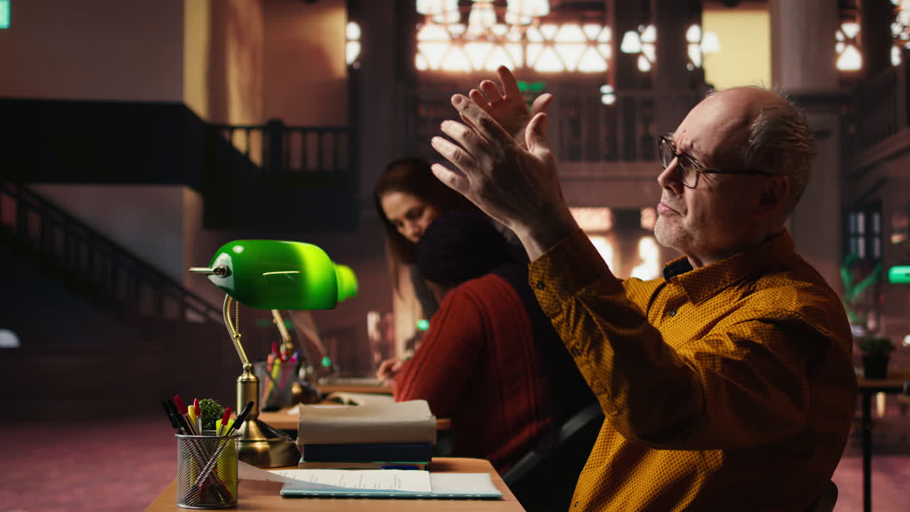 Man in a library setting