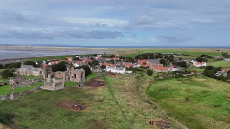 lindisfarne priory holy island england panning drone aerial