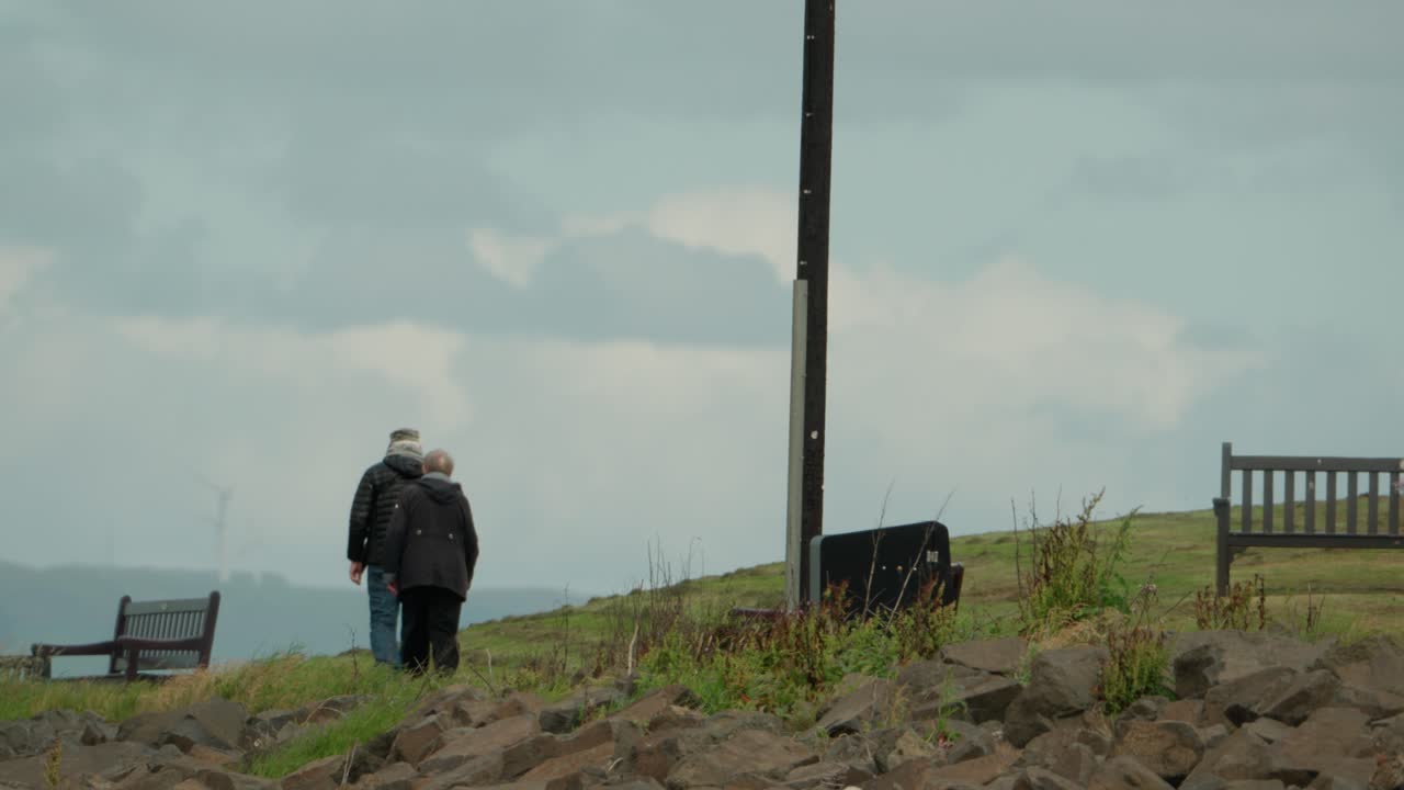 Retirement leisure exercise, coastal walking, elderly couple together