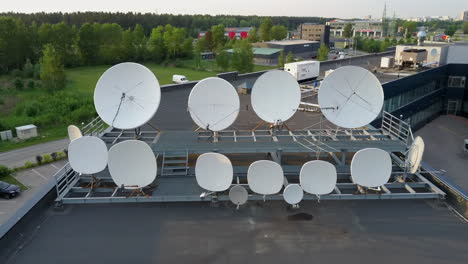 satellites dishes transmitting and receiving digital television broadcast signals