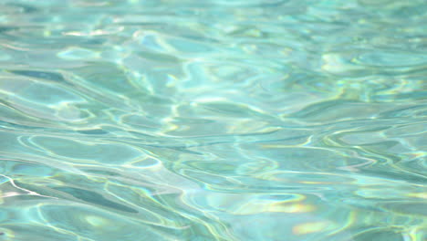 Superficie-Del-Agua-De-La-Piscina-Como-Fondo-Abstracto