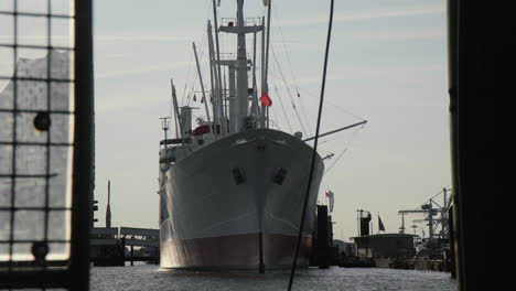 Cap-San-Diego-parking-in-front-of-Hamburg-Elbphilharmonie-on-river-Elbe-early-in-the-morning