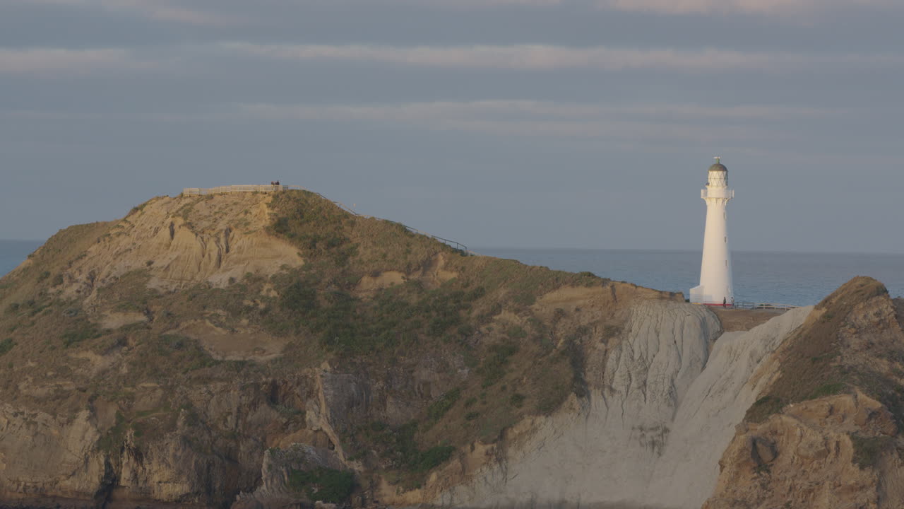 New Zealand's rock formation and lighthouse at Castle Point on the eastern shoreline