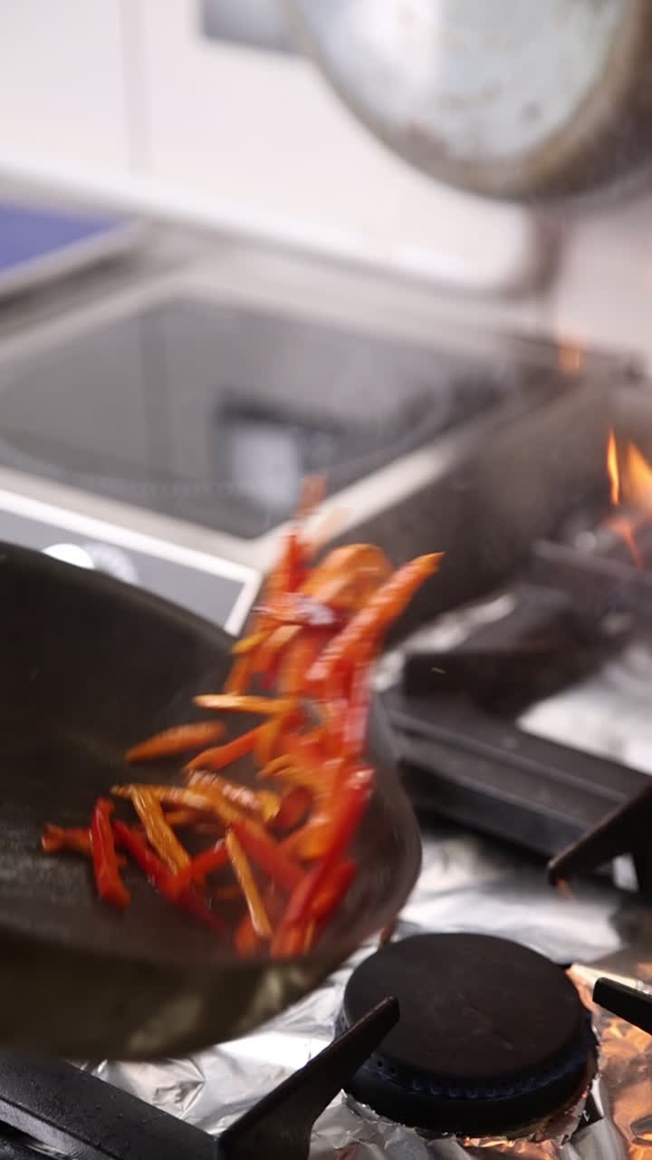 Dynamic Cooking of Sliced Vegetables with Flames in a Wok