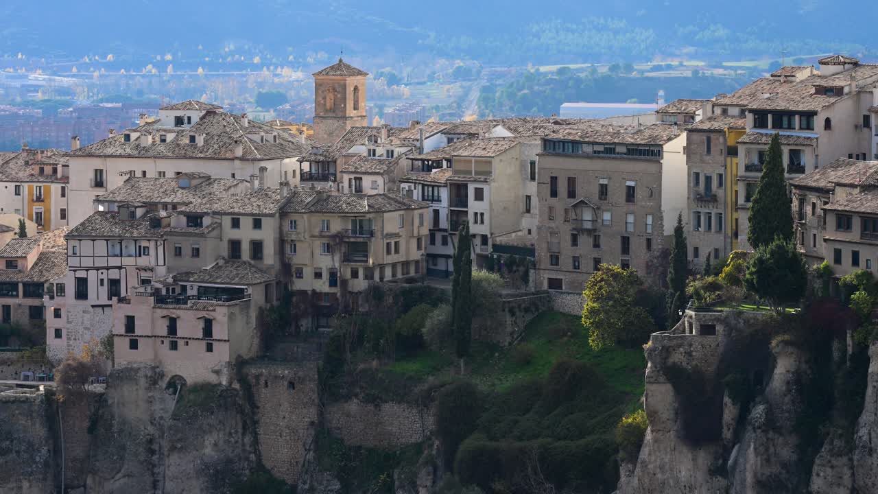 CUENCA, SPAIN - The Hanging Houses (Casas Colgadas), the city's most iconic landmark, are seen built into the dramatic cliffs of this historic UNESCO site.