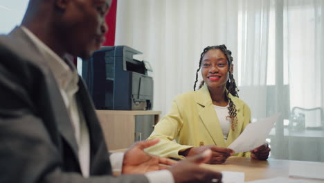 two successful businessmen black woman and black man wear suits salesman banker manager handshake happy client customer investor at business meeting make bank loan insurance investment deal agreement