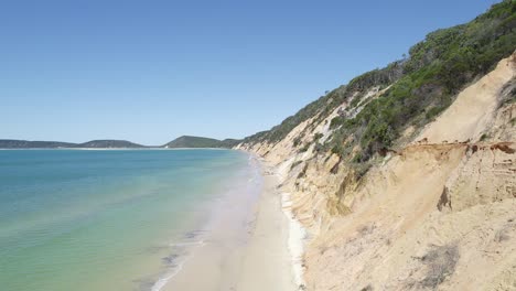 White-Sandy-Shore-At-Rainbow-Beach-In-Queensland,-Australia---aerial-drone-shot