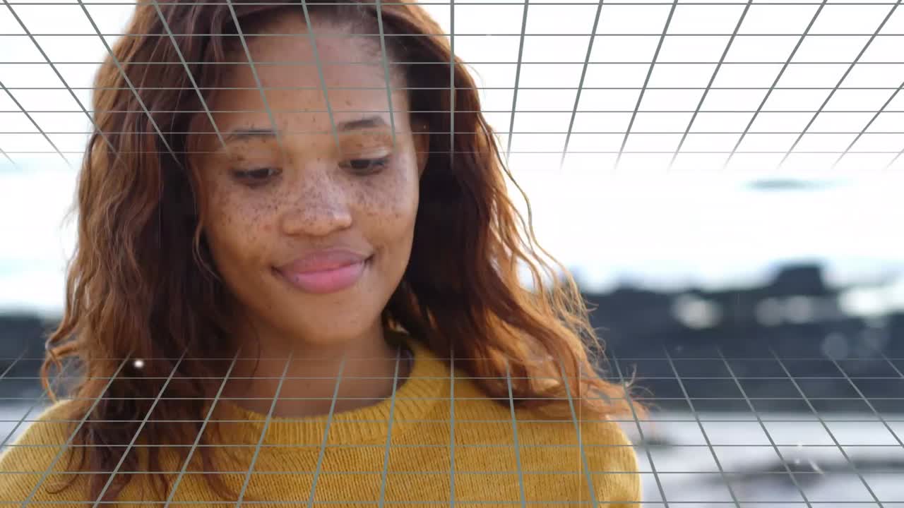 анимация сияющих звезд по сетевой сети против афроамериканской женщины, использующей смартфон