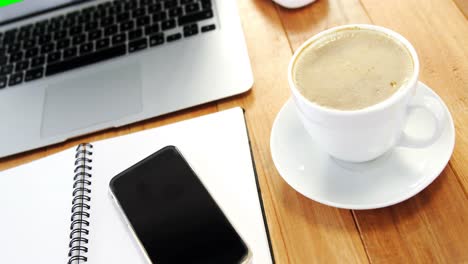 coffee with organizer and mobile phone