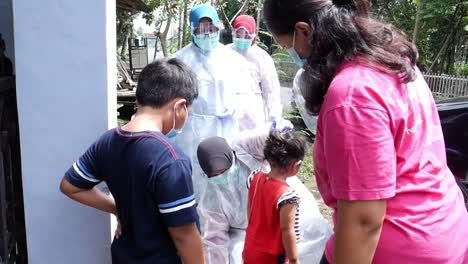 yogyakarta, indonesia - feb 28, 2021 : posyandu is a growth and health monitoring activity for children under 5 years which is carried out routinely every month.