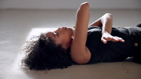 Performance,-woman-and-lying-on-floor-for-dance