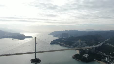 hong kong bay skyline at sunset , high altitude wide aerial shot