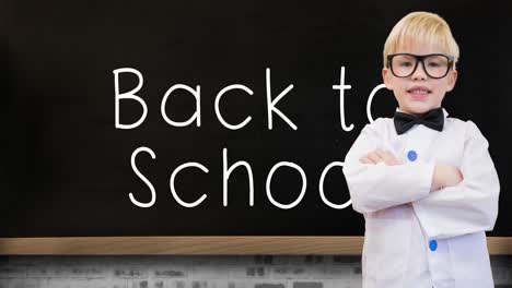 Animation-of-back-to-school-text-and-schoolboy-over-blackboard