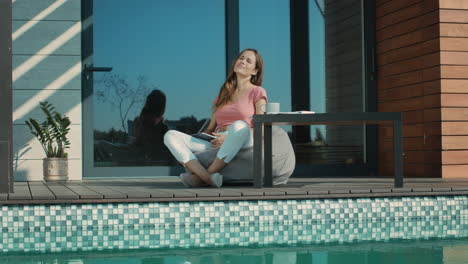 Woman-closing-notebook-after-work.-Female-worker-having-break.