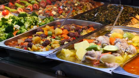 buffet dishes with various foods