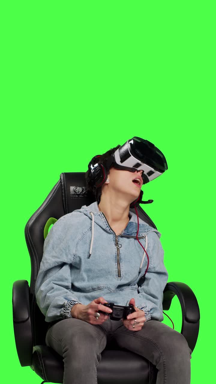 Front view Cheerful player winning online shooter championship against greenscreen